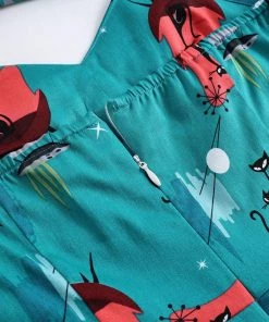 Glitz Glam And Rebellion Turquoise Mid Century Kitty Swing Dress Women's Apparel